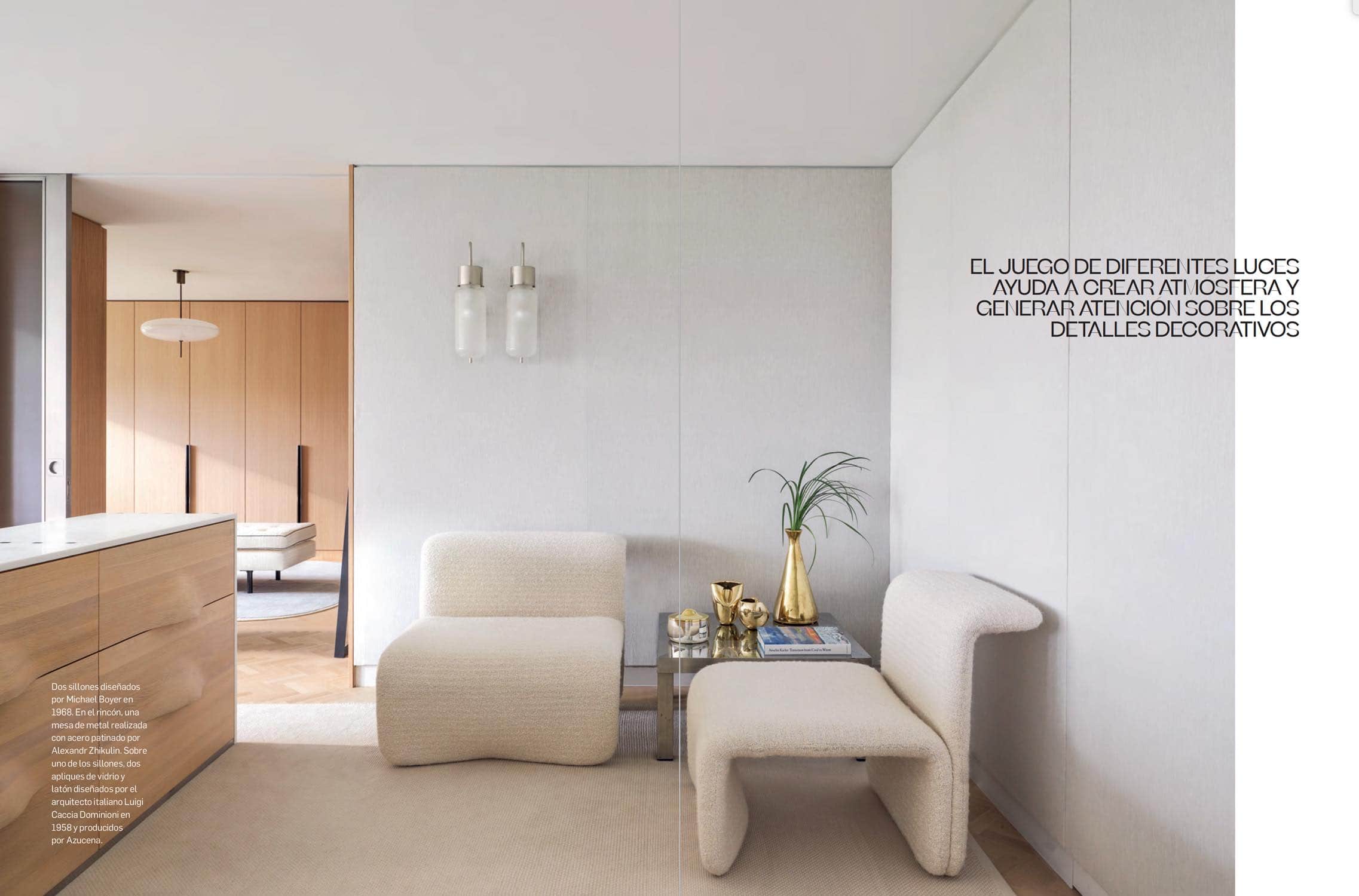 Master bedroom designed by Carol Egan Interiors with 1968 pair of chairs by Michel Boyer, cabinet design by Studio Carol Egan and Bidone wall lamps by Luigi Caccia Dominioni.