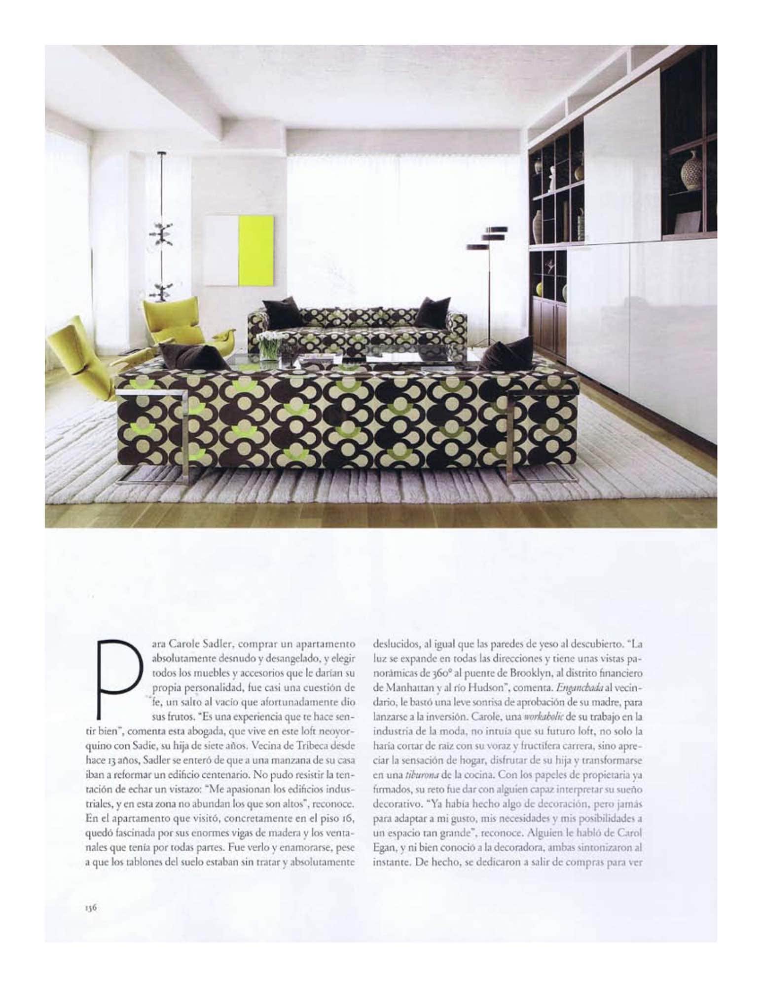 An image of a living room designed by Carol Egan Interiors with custom sofa design by Studio Carol Egan in Prelle fabric by Leleu, coffee table by Joe D Urso, Paulistana lounge armchair by Jorge Zalszupin and custom light sculpture by Lindsey Adelman.  ‘At One Remove’ artwork by Callum Innes