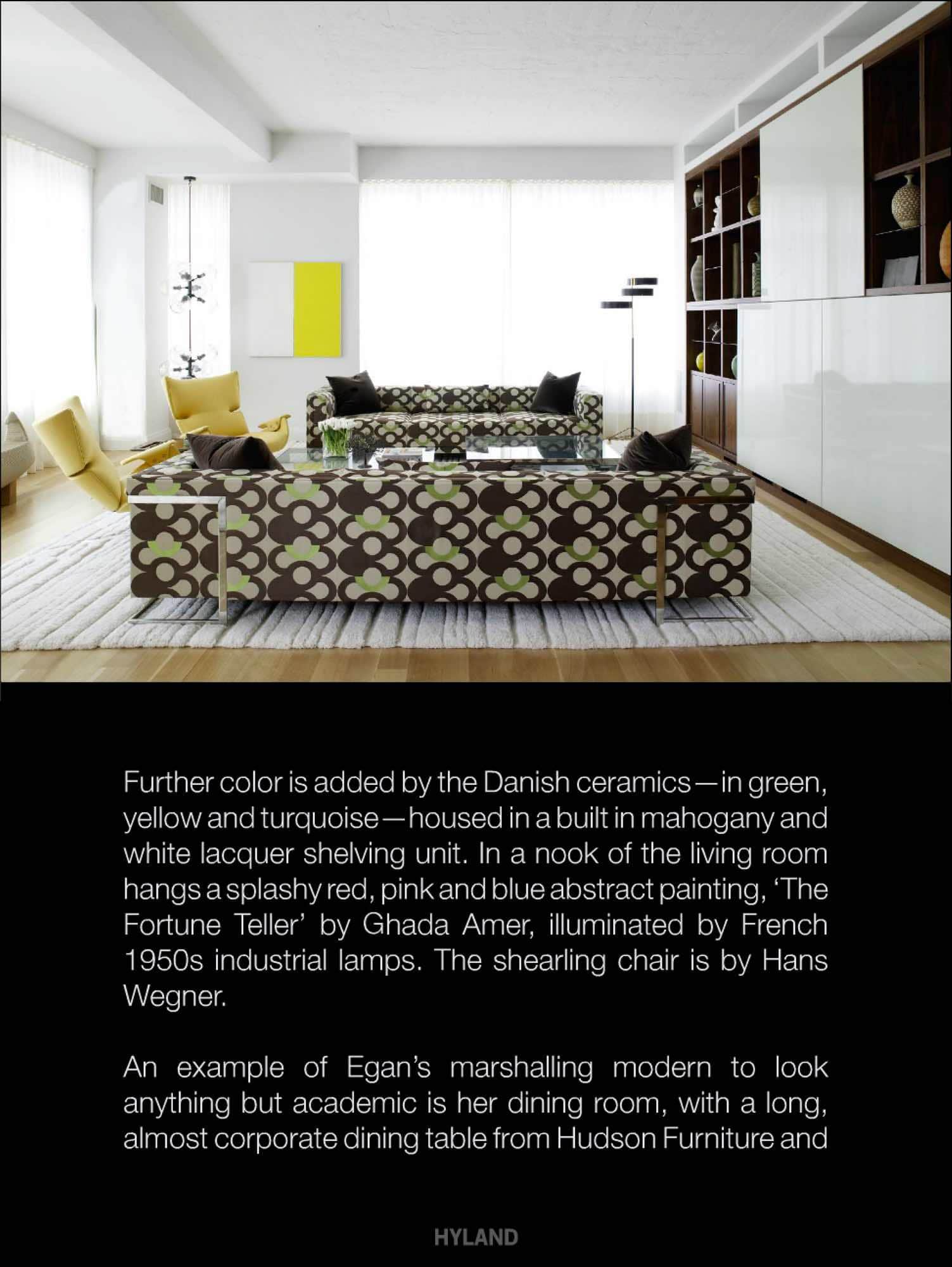 Further color is added by the Danish ceramics - in green, yellow and turquoise - housed in a built in mahogany and white lacquered shelving unit.  In a nook of the living room hangs a splashy red, pink and blue abstract painting, "The Fortune Teller" by Ghada Amer, illuminated by French 1950s.